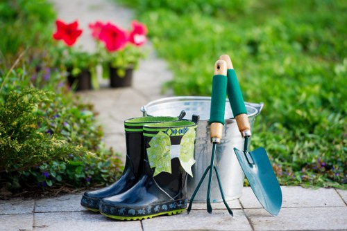 Gardener inspecting equipment before outdoor maintenance work